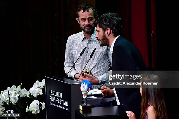 Claude Barras and Max Karli give their acceptance speech after receiving the 'ZFF for Kids' award for their movie 'Ma Vie De Courgette' on stage...