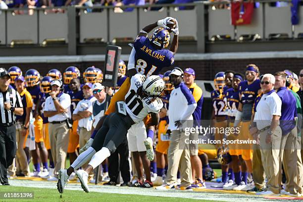 East Carolina Pirates wide receiver Jimmy Williams is unable to come down in bounds with a reception over UCF Knights defensive back Shaquill Griffin...