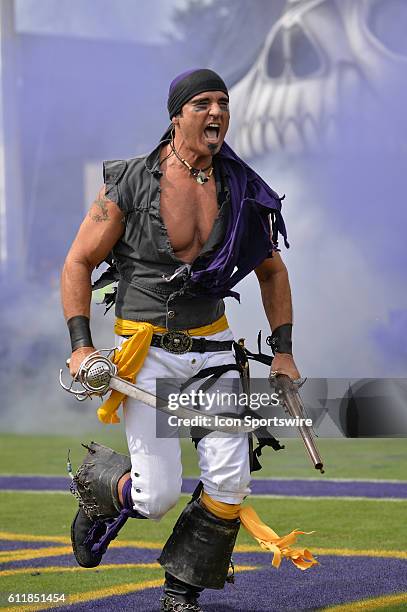 Steve the Pirate leads the team out in a game between the East Carolina Pirates and the Central Florida Knights at Dowdy-Ficklen Stadium in...