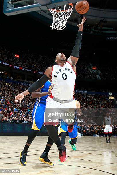 Jared Sullinger of the Toronto Raptors goes to the basket against the Golden State Warriors during a preseason game on October 1, 2016 at Rogers...