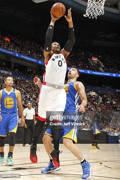 Jared Sullinger of the Toronto Raptors goes to the basket against the Golden State Warriors during a preseason game on October 1, 2016 at Rogers...