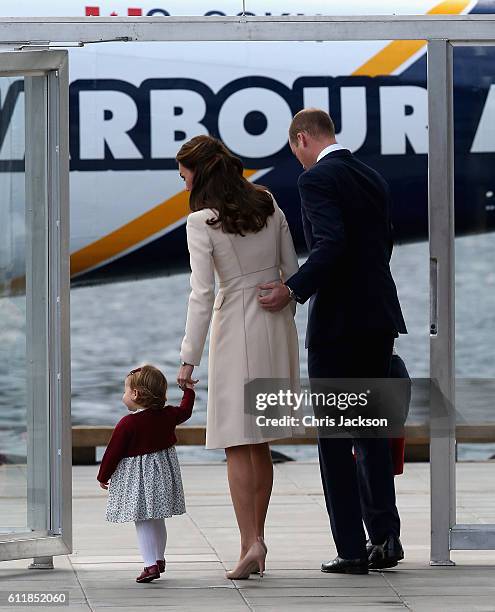 Prince William, Duke of Cambridge, Prince George of Cambridge, Catherine, Duchess of Cambridge and Princess Charlotte leave from Victoria Harbour to...