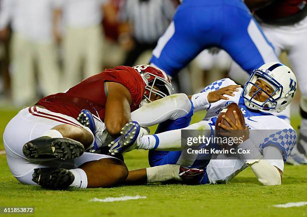 Jonathan Allen of the Alabama Crimson Tide sacks Stephen Johnson of the Kentucky Wildcats at Bryant-Denny Stadium on October 1, 2016 in Tuscaloosa,...