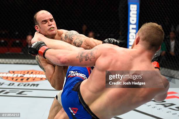 Nate Marquardt kicks Tamdan McCrory in their middleweight bout during the UFC Fight Night event at the Moda Center on October 1, 2016 in Portland,...