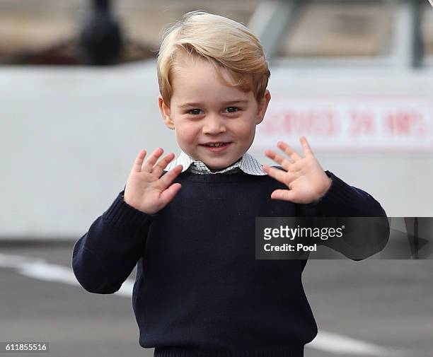 Prince George arrives with family to attend a ceremony to mark their departure at Victoria Harbour seaplane terminal in Victoria during the Royal...