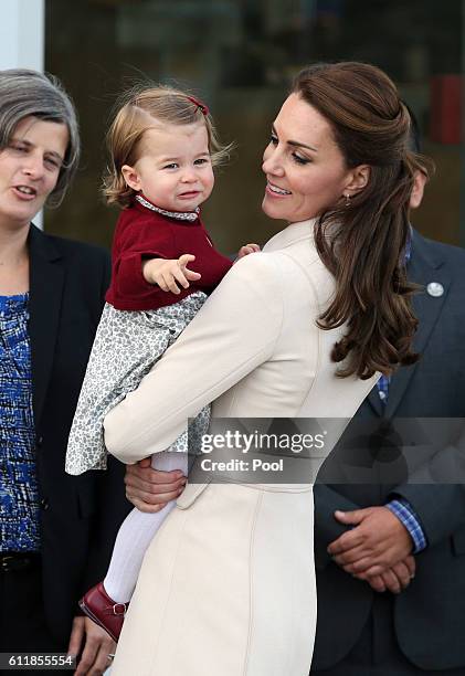 Catherine, Duchess of Cambridge and Princess Charlotte attend a ceremony to mark their departure at Victoria Harbour seaplane terminal in Victoria...