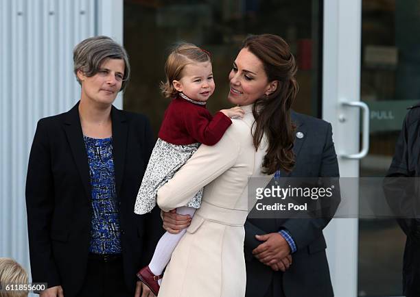 Catherine, Duchess of Cambridge and Princess Charlotte attend a ceremony to mark their departure at Victoria Harbour seaplane terminal in Victoria...