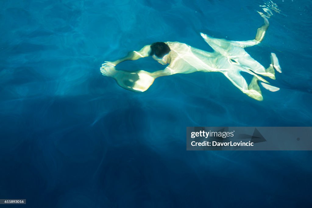 The metamorphosis of the man in water