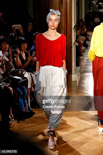 Model walks the runway during the Undercover designed by Jun Takahashi show as part of the Paris Fashion Week Womenswear Spring/Summer 2017 on...