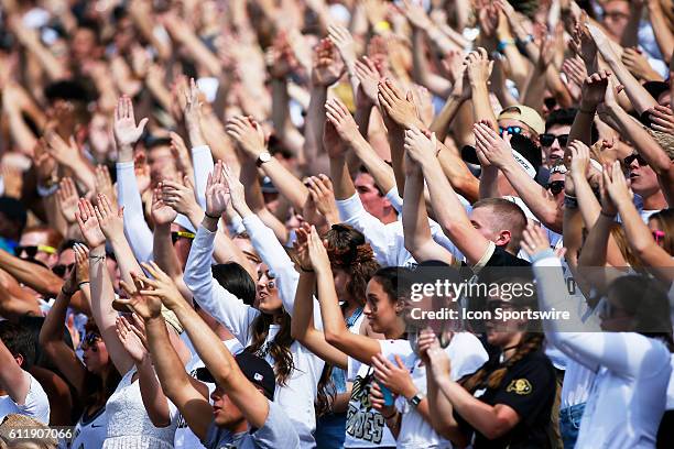 Colorado fans cheer during a Pac-12 conference match-up between the Colorado Buffaloes and the visiting Oregon State Beavers at Folsom Field in...