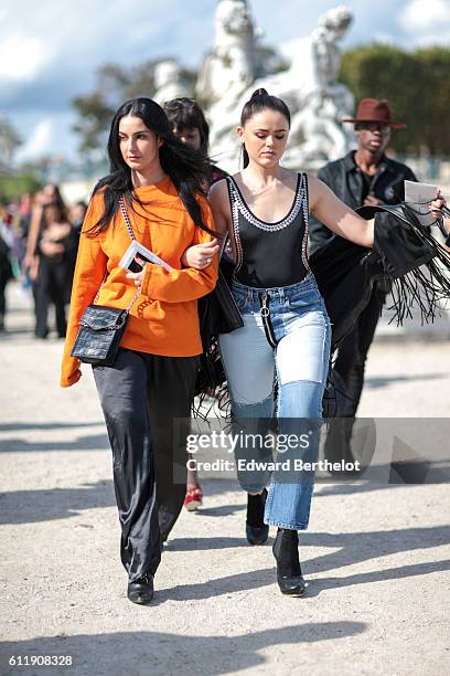 Fiona Zanetti and Kristina Bazan are seen, outside the Elie Saab show, during Paris Fashion Week Spring Summer 2017, at the Tuileries garden, on...