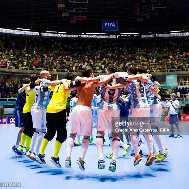 Argentina players celebrate after the victory during the FIFA Futsal World Cup final between Russia and Argentina at Coliseo el Pueblo on October 1,...