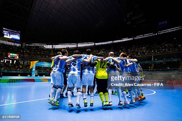 Argentina players celebrate after the victory during the FIFA Futsal World Cup final between Russia and Argentina at Coliseo el Pueblo on October 1,...