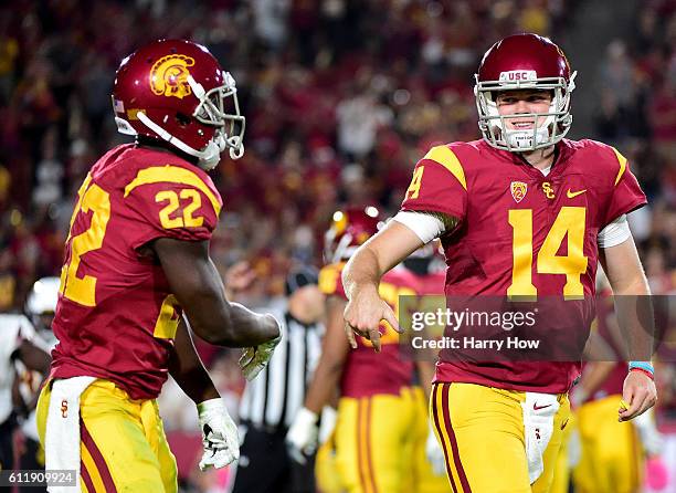 Quarterback Sam Darnold of the USC Trojans celebrates the touchdown of running back Justin Davis to take a 24-6 lead over the Arizona State Sun...