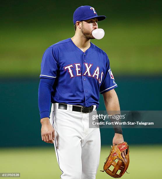 Texas Rangers third baseman Joey Gallo blows a bubble between pitches to the Tampa Bay Rays during the third inning on Saturday, Oct. 1 at Globe Life...