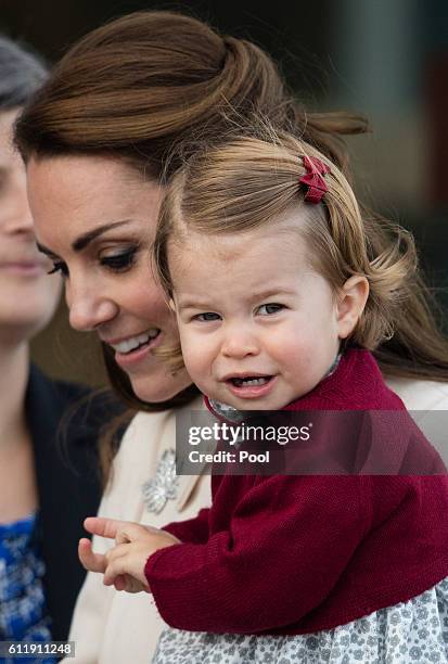 Catherine, Duchess of Cambridge and Princess Charlotte of Cambridge depart Victoria on October 1, 2016 in Victoria, Canada.