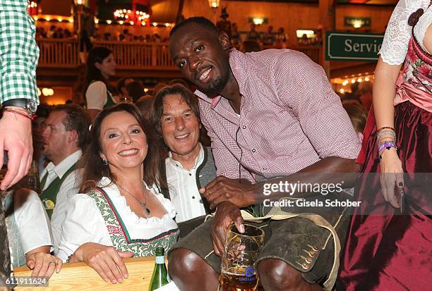 Uschi Daemmrich von Luttitz, Dr. Hans-Wilhelm Mueller-Wohlfahrt and Usain Bolt, sprinter, ninefold olympic champion and elevenfold world champion...