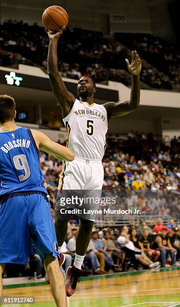 Lance Stephenson of the New Orleans Pelicans goes to the basket against the Dallas Mavericks during a preseason game on October 1, 2016 at...
