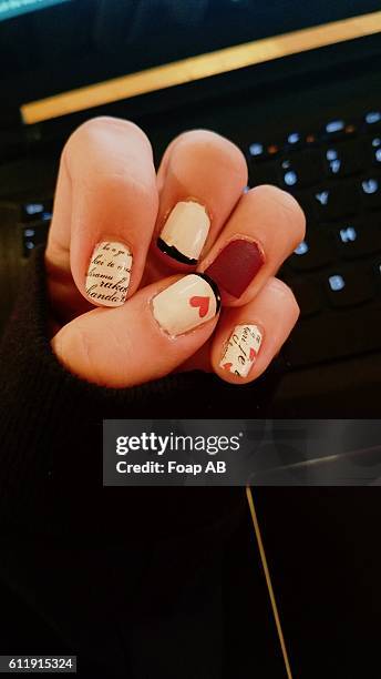 fingernails with different nail art design - heart nail art stock pictures, royalty-free photos & images