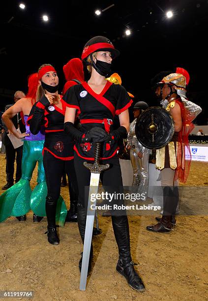 Jane Richards Phillips and Destry Spielberg walk the course during the Pro-Am for Charity event during the Longines Masters of Los Angeles 2016 at...