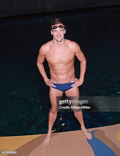 Olympian Ryan Lochte poses as he prepares to get into the pool at the "O" theater as he and dancer Cheryl Burke rehearse for their "Dancing with the...