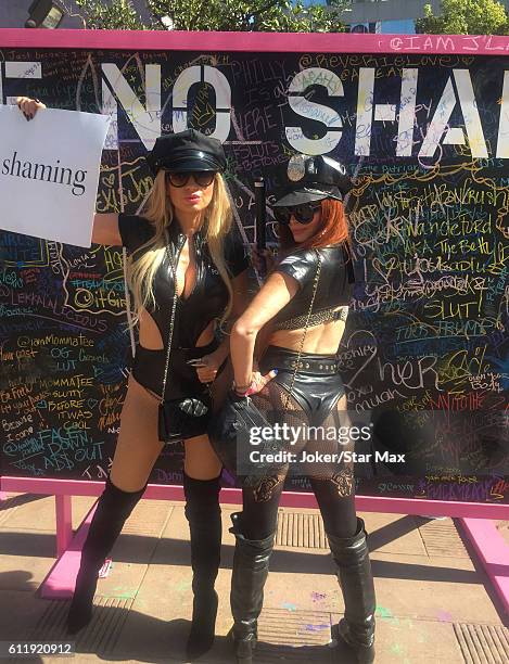 Model Ana Braga and actress Phoebe Price are seen on October 1, 2016 in Los Angeles, California.