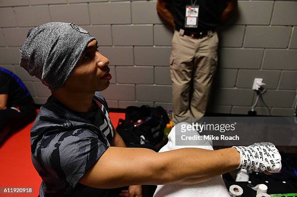 John Dodson gets his hands wrapped backstage during the UFC Fight Night event at the Moda Center on October 1, 2016 in Portland, Oregon.