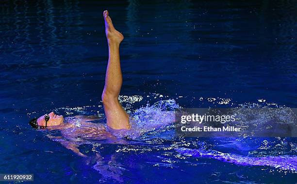 Olympian Ryan Lochte swims in the pool at the "O" theater as he and dancer Cheryl Burke rehearse for their "Dancing with the Stars" performance with...