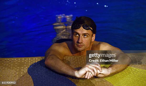 Olympian Ryan Lochte swims in the pool at the "O" theater as he and dancer Cheryl Burke rehearse for their "Dancing with the Stars" performance with...