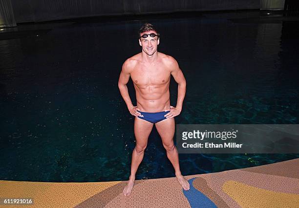 Olympian Ryan Lochte poses as he prepares to get into the pool at the "O" theater as he and dancer Cheryl Burke rehearse for their "Dancing with the...