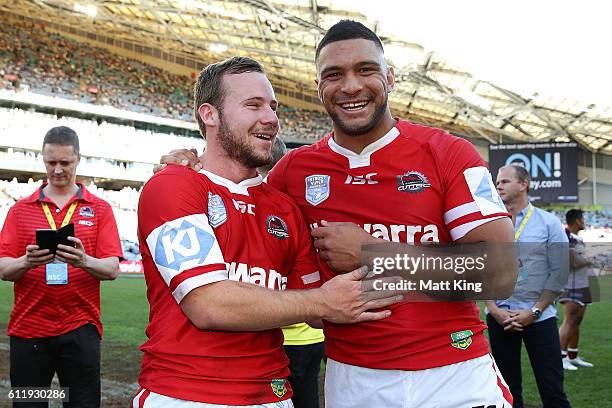 Adam Quinlan and Taane Milne of the Cutters celebrate winning the 2016 State Championship Grand Final match between the Illawarra Cutters and the...