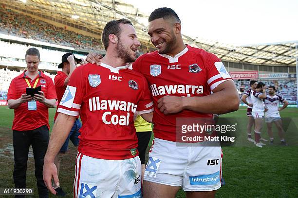 Adam Quinlan and Taane Milne of the Cutters celebrate winning the 2016 State Championship Grand Final match between the Illawarra Cutters and the...