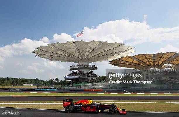 Max Verstappen of the Netherlands driving the Red Bull Racing Red Bull-TAG Heuer RB12 TAG Heuer comes into the pits during the Malaysia Formula One...
