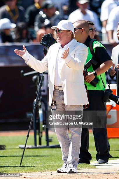 Owner Mark Davis of the Oakland Raiders stands on the sidelines before the game against the Atlanta Falcons at Oakland-Alameda County Coliseum on...