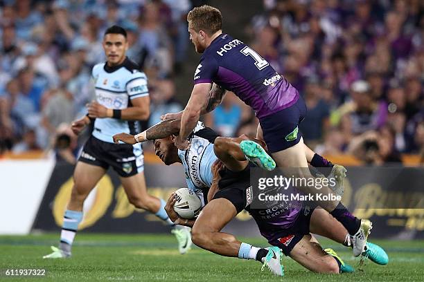 Ben Barba of the Sharks is tackled during the 2016 NRL Grand Final match between the Cronulla Sharks and the Melbourne Storm at ANZ Stadium on...