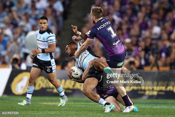 Ben Barba of the Sharks is tackled during the 2016 NRL Grand Final match between the Cronulla Sharks and the Melbourne Storm at ANZ Stadium on...