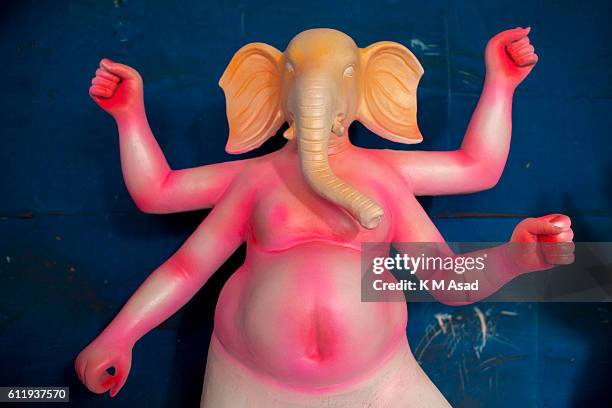 Sculpture of a Hindus Goddess Ganesh in Old Dhaka. Bangladeshi Hindu community people take preparation for the upcoming Durga Puja festival in...