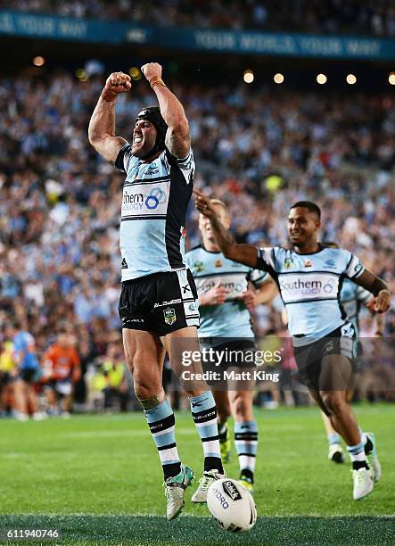 Michael Ennis of the Sharks celebrates the try to Andrew Fifita of the Sharks during the 2016 NRL Grand Final match between the Cronulla Sharks and...