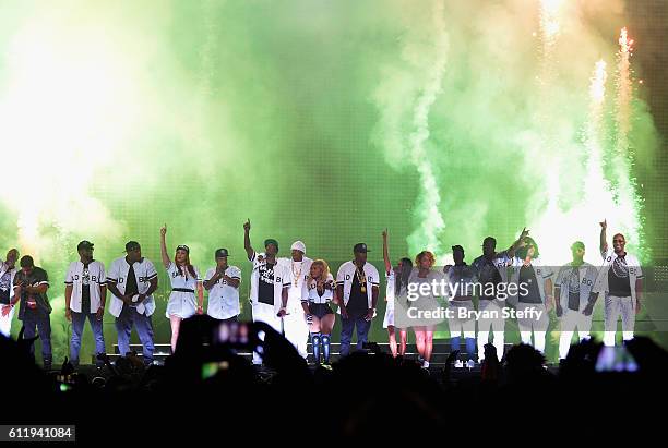 Recording artists Sheek Louch, Faith Evans, Sean "Puff Daddy' Combs, Lil Kim, Jadakiss and Kima Raynor Dyson, Pamela Long and Keisha Spivey Epps of...