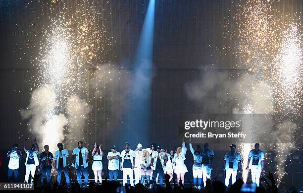 Recording artists Sheek Louch, Faith Evans, Sean "Puff Daddy' Combs, Lil Kim, Jadakiss and Kima Raynor Dyson, Pamela Long and Keisha Spivey Epps of...