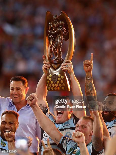 Paul Gallen of the Sharks lifts The Provan-Summons Trophy during the 2016 NRL Grand Final match between the Cronulla Sutherland Sharks and the...