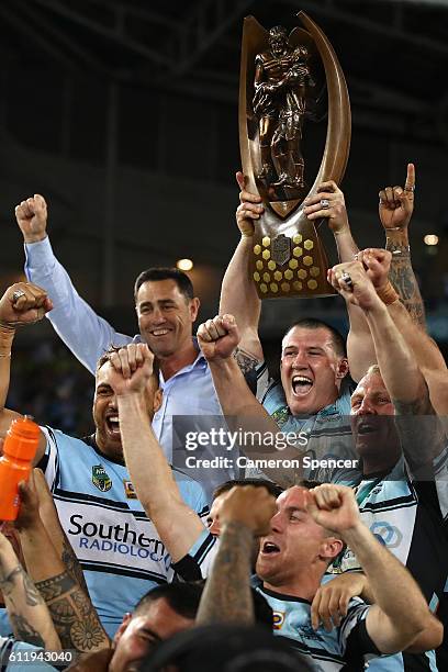 Sharks captain, Paul Gallen celebrates with team mates after winning the 2016 NRL Grand Final match between the Cronulla Sharks and the Melbourne...