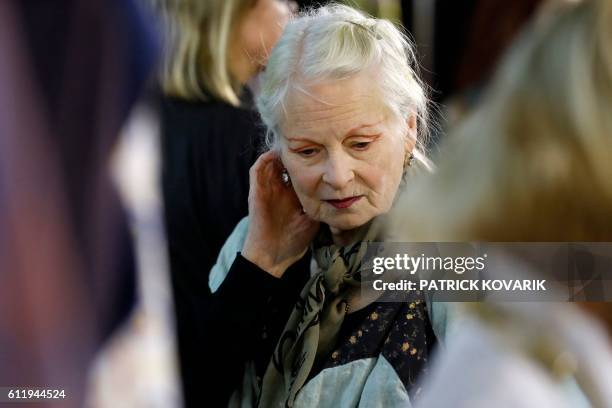 Fashion designer Vivienne Westwood is seen backstage prior to her 2017 Spring/Summer ready-to-wear collection fashion show by Vivienne Westwood, on...