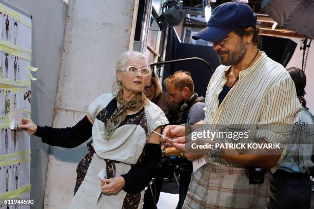 Fashion designer Vivienne Westwood and her husband Andreas Kronthaler talk backstage prior to the 2017 Spring/Summer ready-to-wear collection fashion...