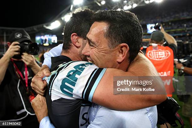 Sharks coach, Shane Flanagan celebrates with Michael Ennis of the Sharks after winning the 2016 NRL Grand Final match between the Cronulla Sharks and...