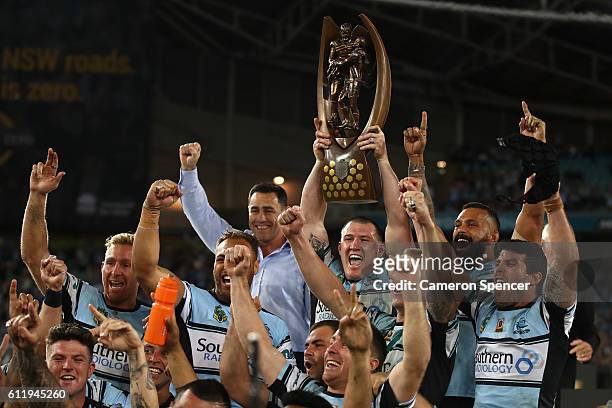 Sharks captain, Paul Gallen celebrates with team mates after winning the 2016 NRL Grand Final match between the Cronulla Sharks and the Melbourne...
