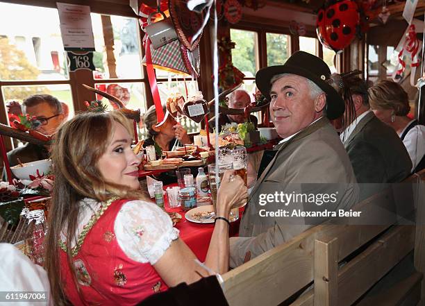 Team coach Carlo Ancelotti of FC Bayern Muenchen and his wife Mariann Barrena McClay attend the Oktoberfest beer festival at Kaefer Wiesenschaenke...