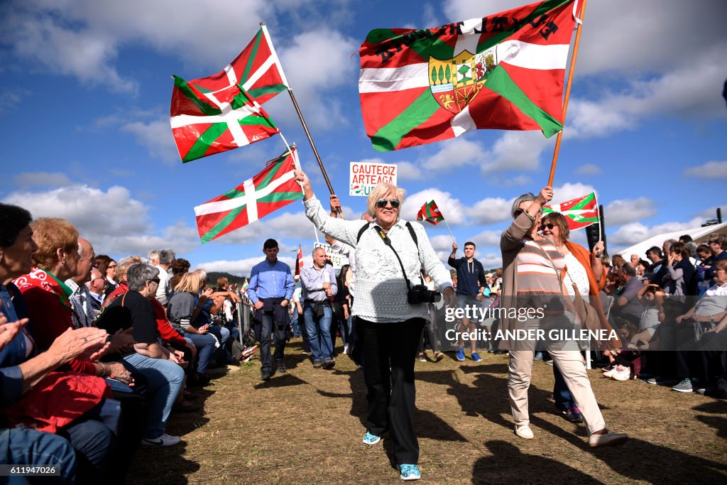 Basque Party Basque Nationalist Party members carry 'Ikurrinas' as they parade ...