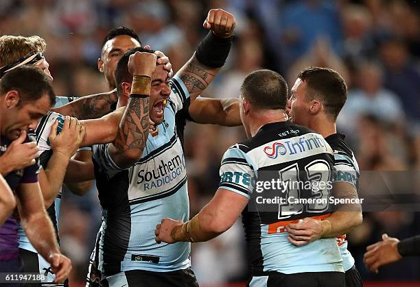 Andrew Fifita of the Sharks celebrates with team mates after scoring a try during the 2016 NRL Grand Final match between the Cronulla Sharks and the...