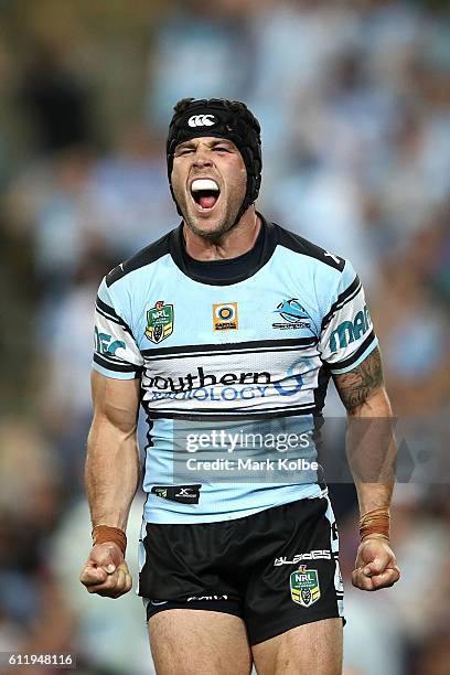 Michael Ennis of the Sharks celebrates a Sharks try during the 2016 NRL Grand Final match between the Cronulla Sharks and the Melbourne Storm at ANZ...